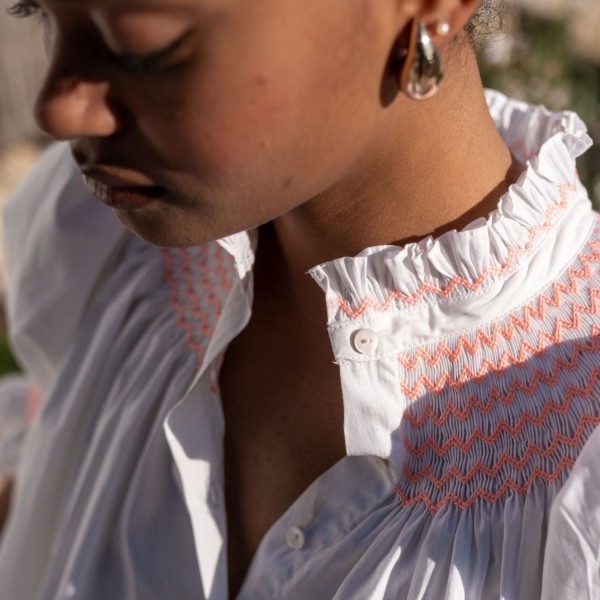 Scholl Women's Summer Blouse White with Coral Hand Smocking Scholl Women's Summer Blouse White with Coral Hand Smocking